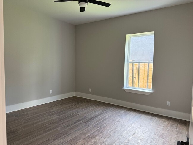 Building Photo - 3/2/1 NEW CONSTRUCTION LISD fenced yard an...