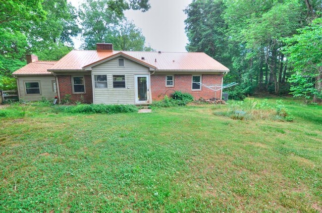 Building Photo - Fruit Trees + 2.5 Acres + a Chicken Coop! Near Hillsborough, Durham, and Eno River State Park! - ...