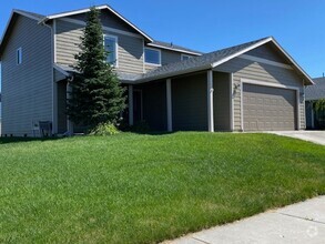 Building Photo - Large Corner Lot 4BR, 2.5BA Cheney Home In...