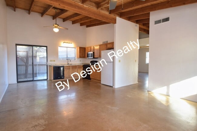 Building Photo - Charming Mid-Century Style: Vaulted Beams & Private Oversized Yard
