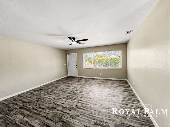Building Photo - Tree-Lined 2BR/1BA Fort Myers Duplex with Fenced Yard, Storage Shed & In-Unit Laundry!
