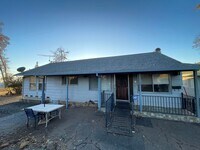 Building Photo - Paradise 3 bedroom 2 1/2 bath, large home, shop, natural landscaping.