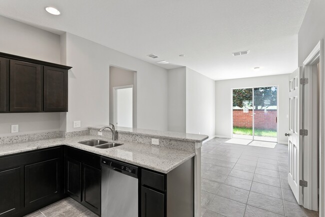 Building Photo - 4/2.5 Beautiful Energy Efficient Townhome ...