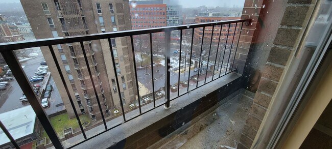 Building Photo - Top floor unit with a stunning open view! Walk to Longwood!