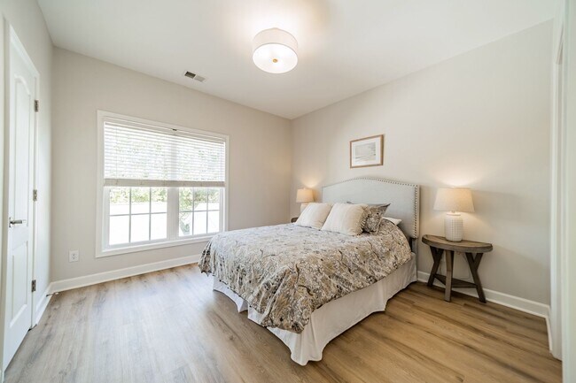 Building Photo - UPGRADES! Two Bedroom Townhouse - Six Mont...