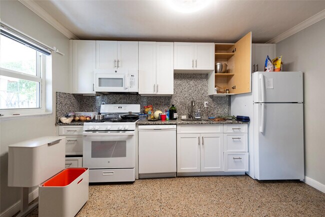 Building Photo - 5448 NE 3rd Ter.