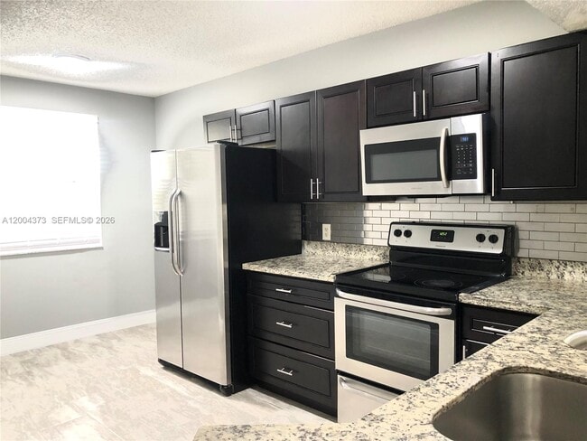 Building Photo - 8761 Wiles Rd