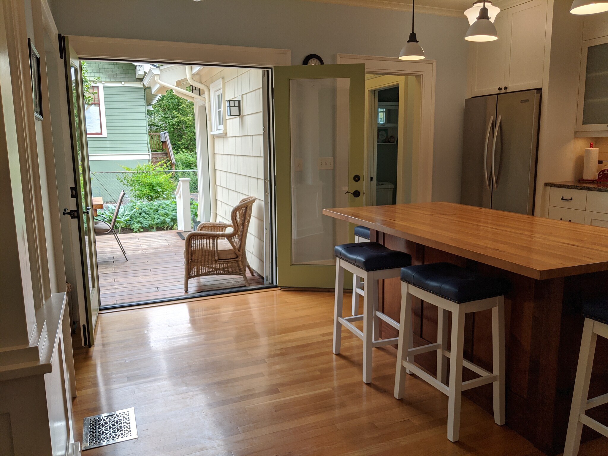 French doors open to the large deck from the kitchen - 2216 SE 24th Ave
