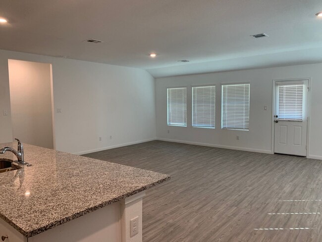Building Photo - Luxury Vinyl Plank (No Carpet) /  Fridge Included / Office / Covered Back Patio / CISD