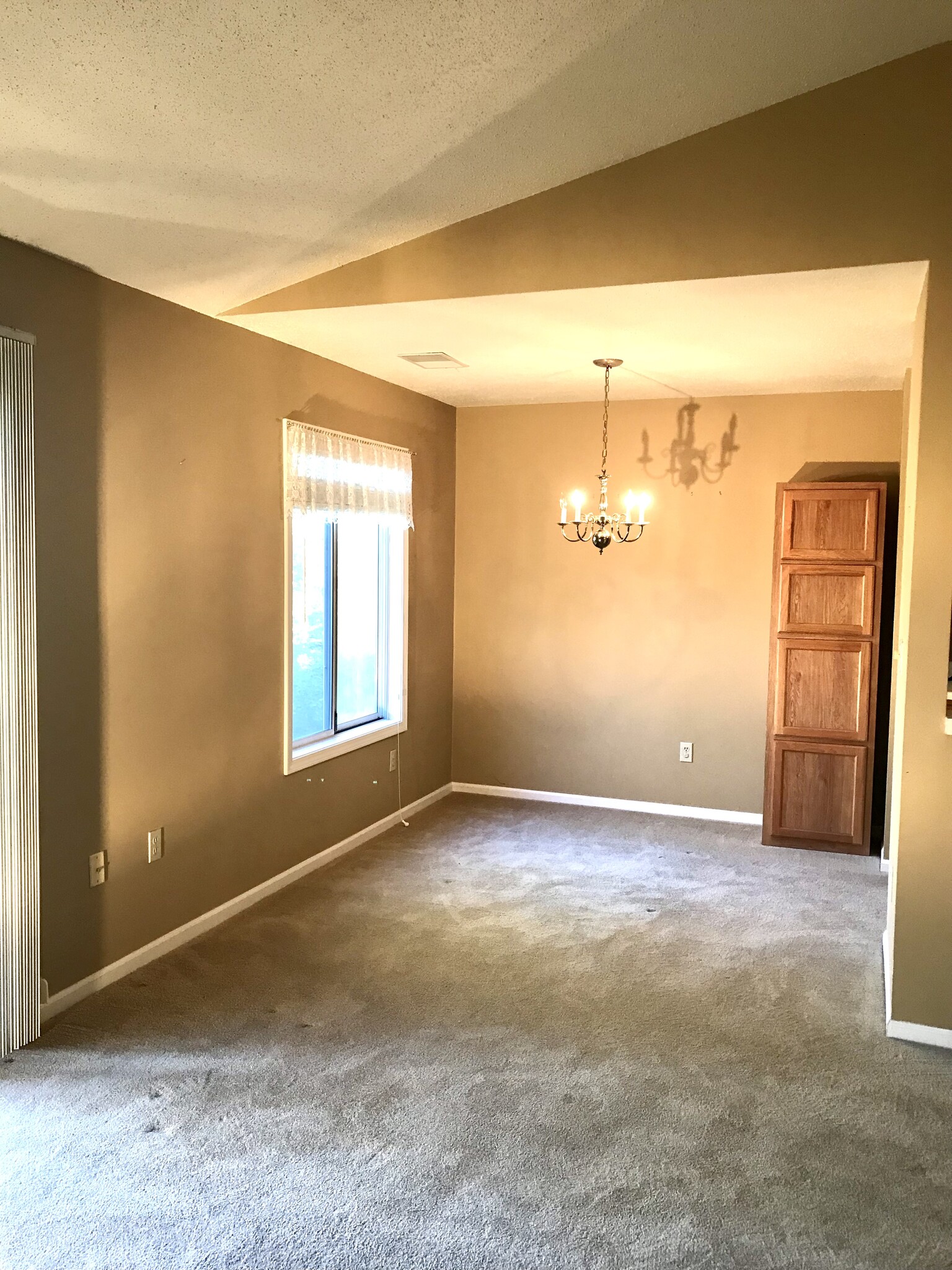 Separate dining area with extra storage cabinets - 3173 Windcrest Dr NE