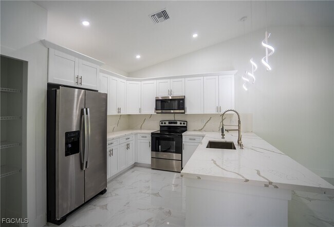 Building Photo - 4935 Leonard Blvd S