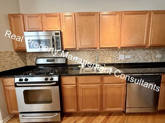 Building Photo - Luxury Living at Western Auto Building – 2 Bed, 2 Bath