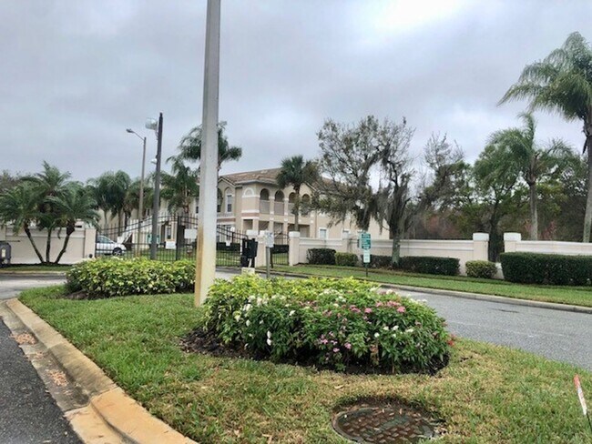 Building Photo - Nice 2X2 located on 2nd floor- Tile & lami...