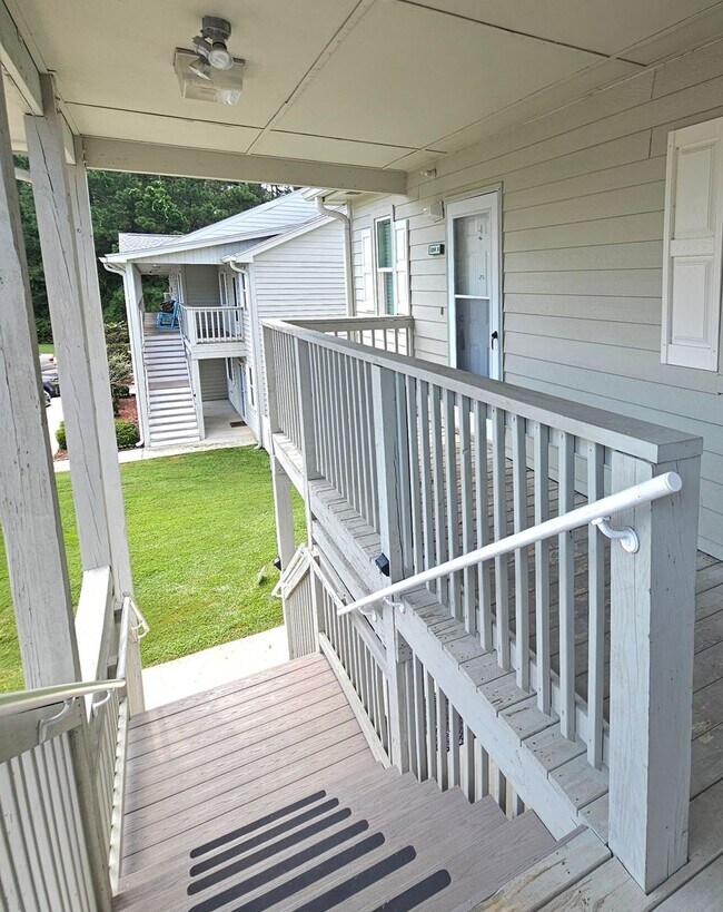 Building Photo - Spacious 2-Bedroom End-Unit Condo Near Surfside Beach