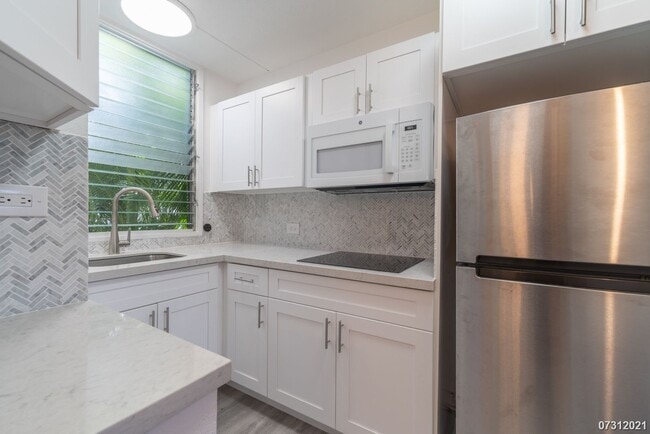 Building Photo - RECENTLY RENOVATED GROUND FLOOR PUALEI CIR...