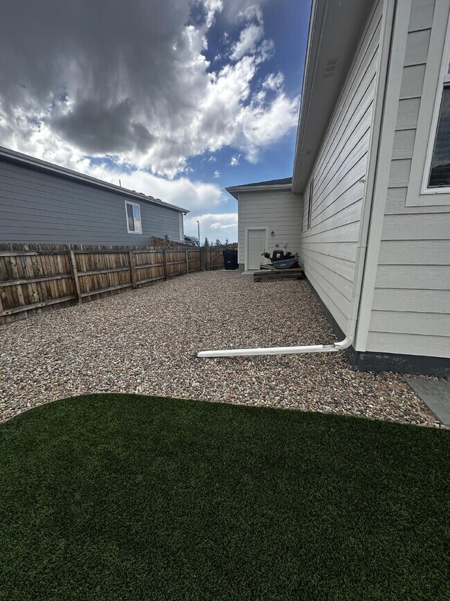 Building Photo - "Charming 4-Bedroom Castle Rock Home with Spacious Living!"
