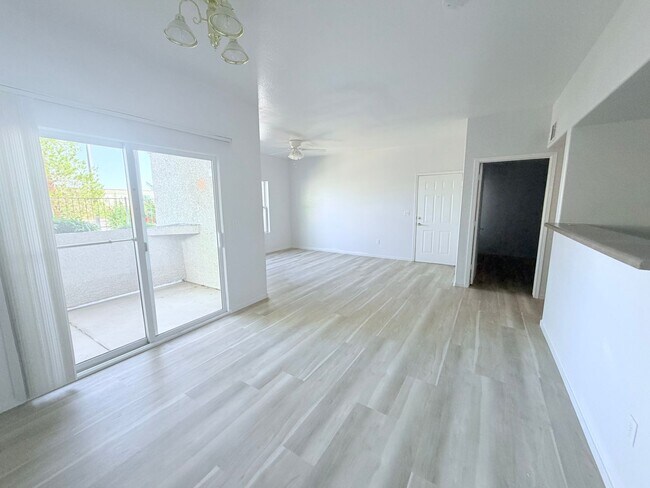 Building Photo - Lower than comps Tuscano condo