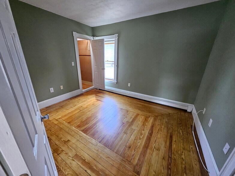 Bedroom 1 with walk in closet - 22 Sparhawk St