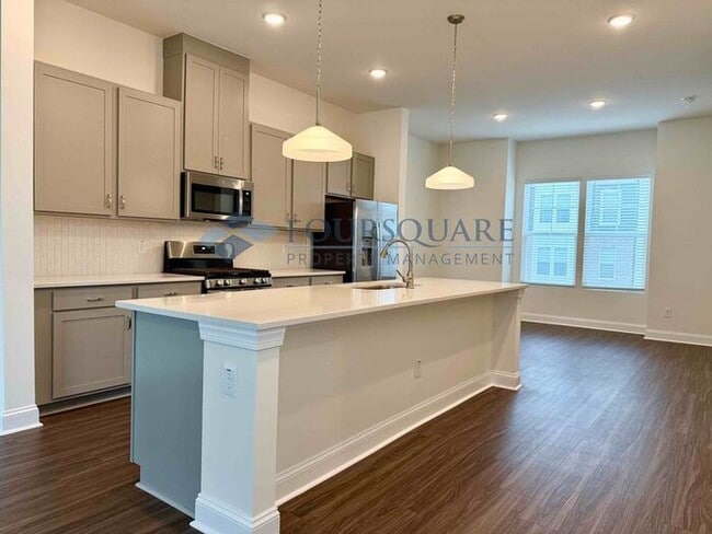 Building Photo - Bright End-Unit 3-Bed / 2.5-Bath Townhome with Flex Space, Gourmet Kitchen & 2-Car Garage – Walka...