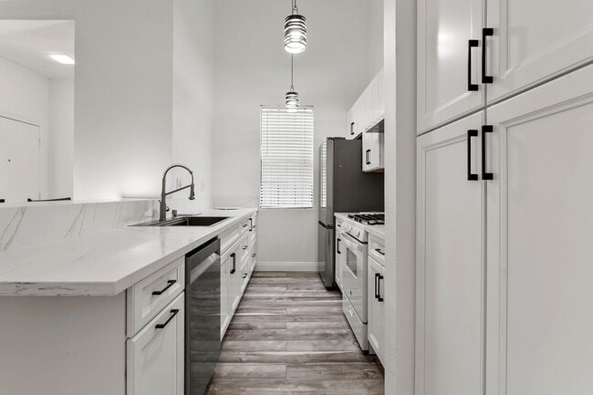 Building Photo - UPGRADED ONE BEDROOM OASIS IN GATED COMMUNITY