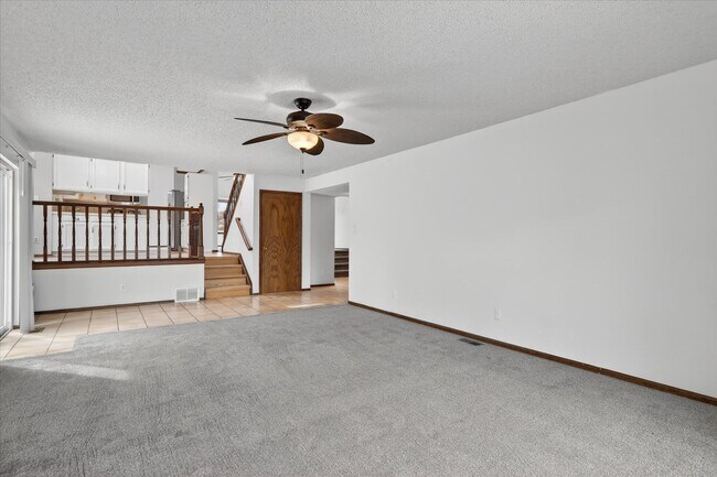 Building Photo - 4BR/4BA Updated Home with Finished Basement Suite & Landscaped Yard