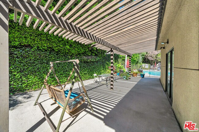 Building Photo - 4477 Woodman Ave