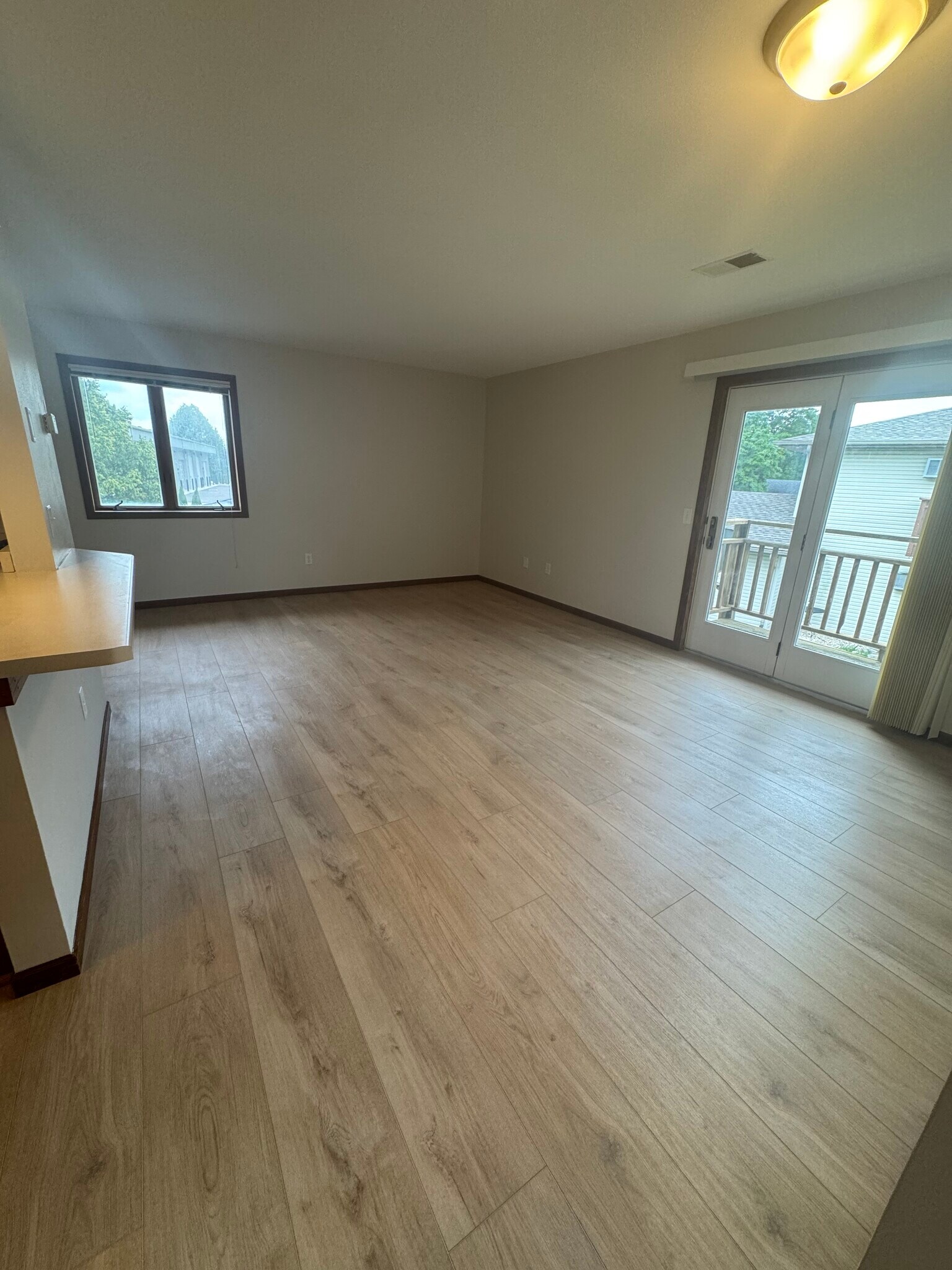Living Room with Balcony - 18 Stonehaven Dr