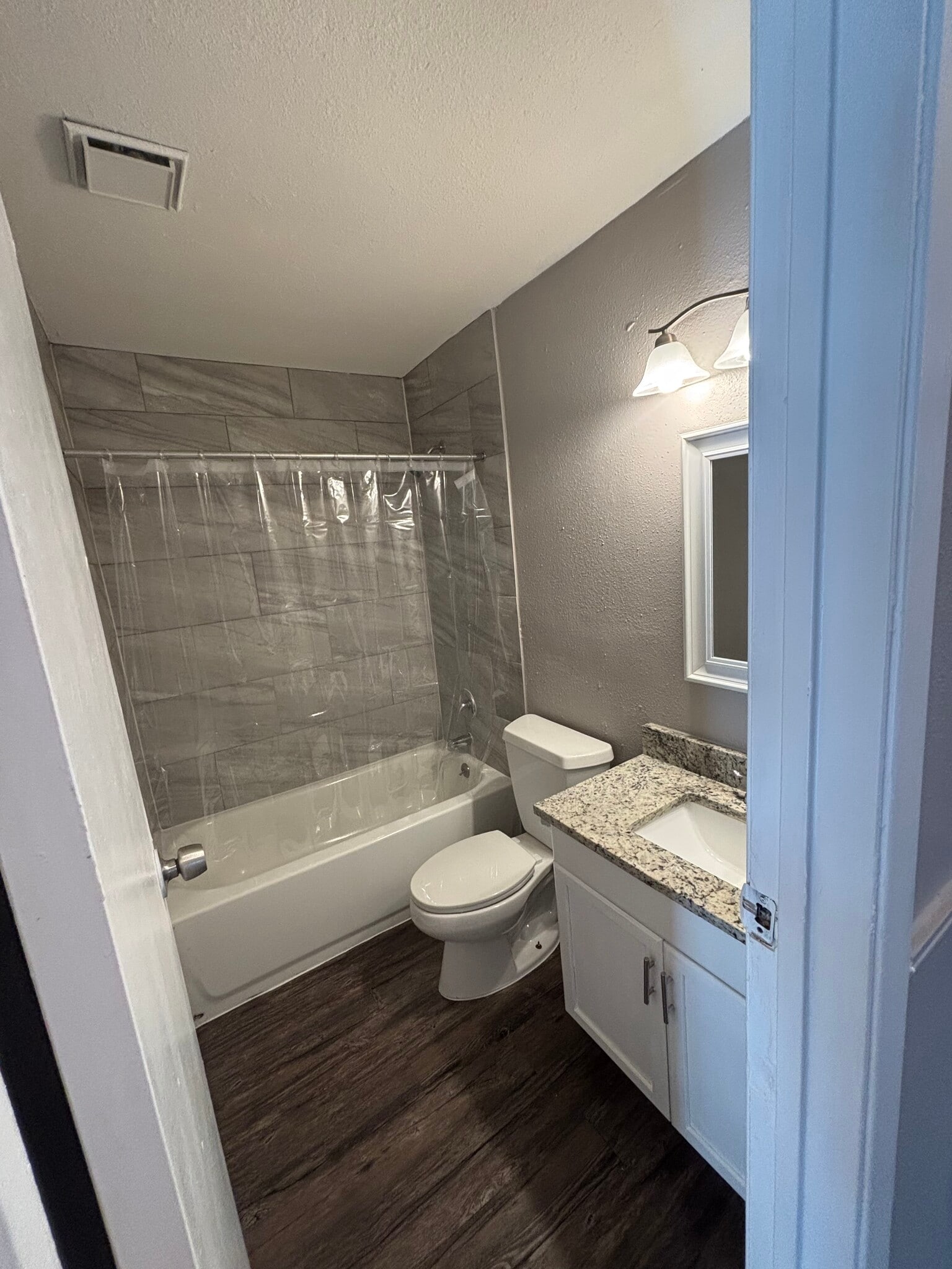 Guest bathroom has tile and granite too! - 4122 Alaskian Sunrise