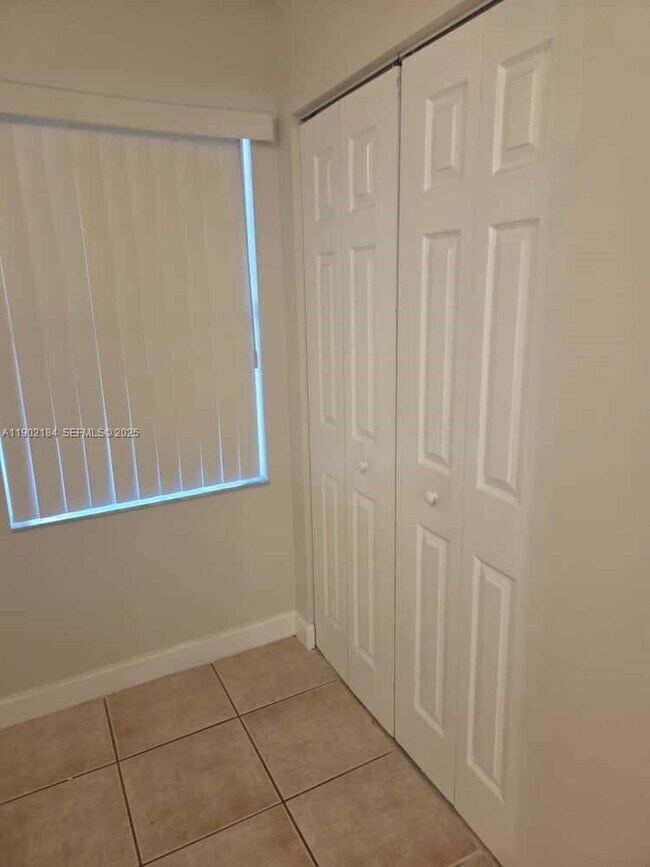 Building Photo - 7406 Woodmont Terrace