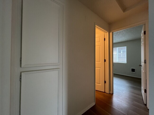 Building Photo - Inviting 2 Bedroom Home with Open Layout, Stainless Steel Appliances & Private Outdoor Retreat