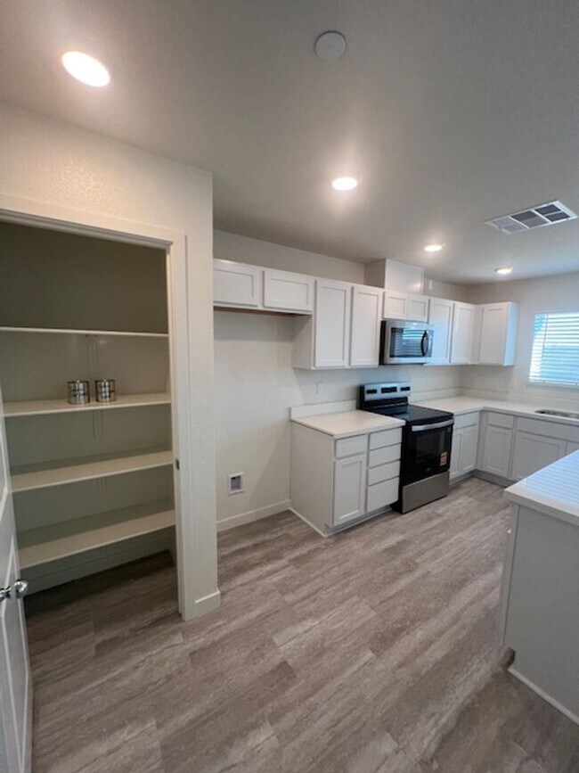 Building Photo - Brand New DR Horton Solar Smart Home with 4 Bedrooms.