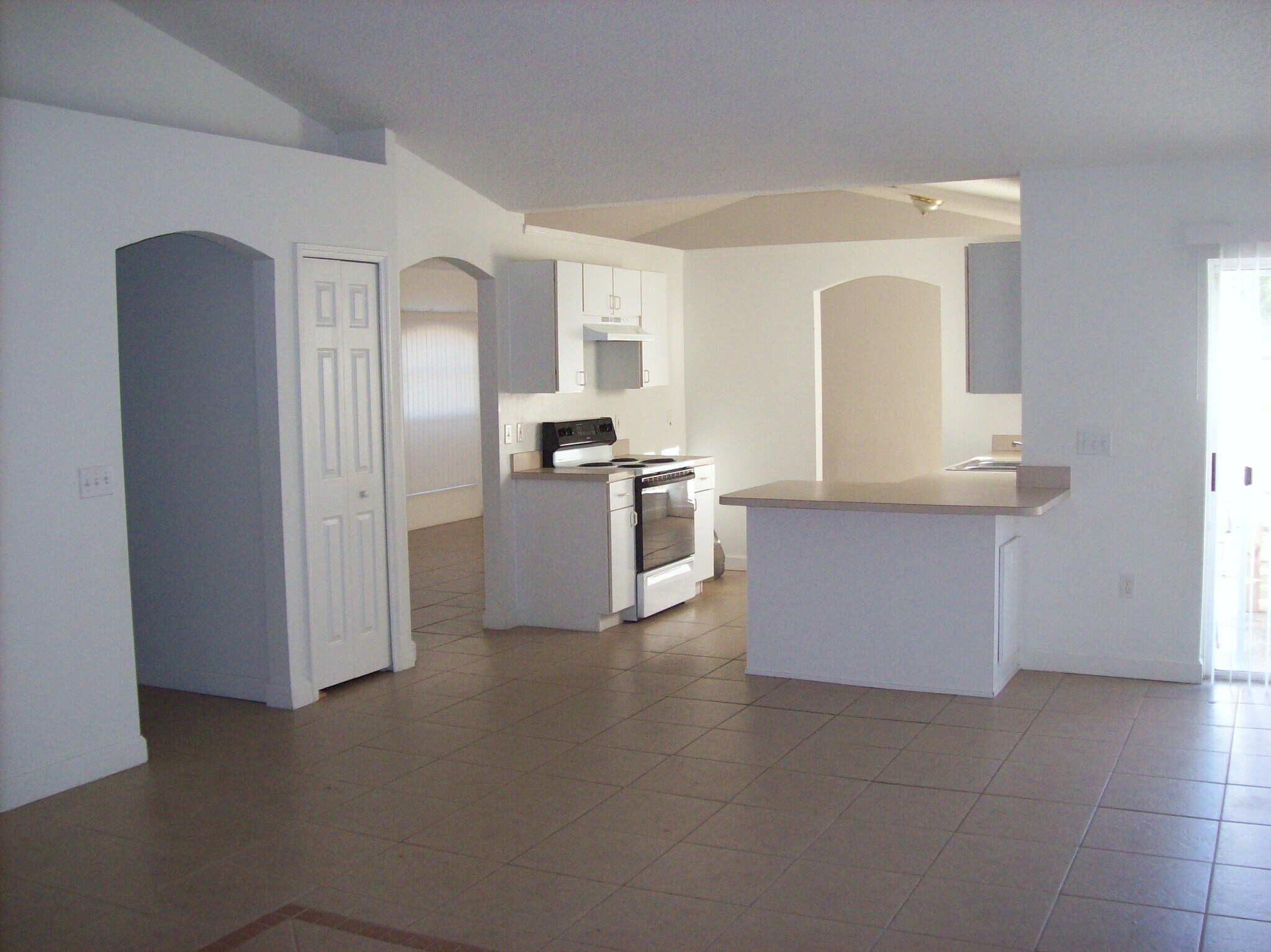 View From family room to kitchen and breakfast nook and bar - 1903 Veronica Ave