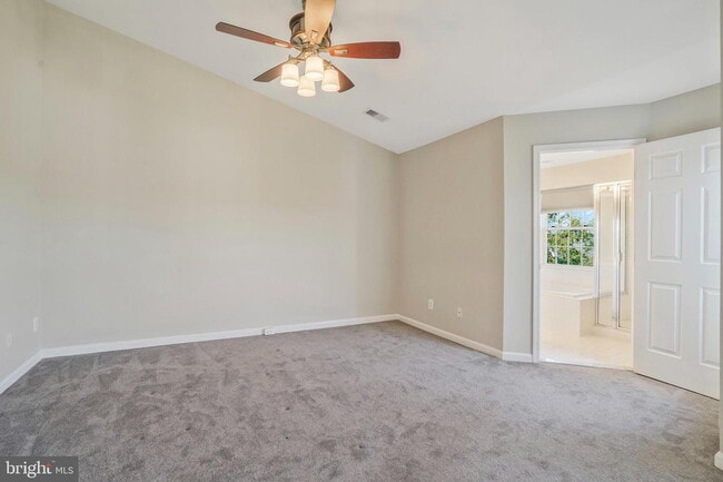 Building Photo - This beautifully maintained brick-front, three-level townhome is located in a highly sought-after...