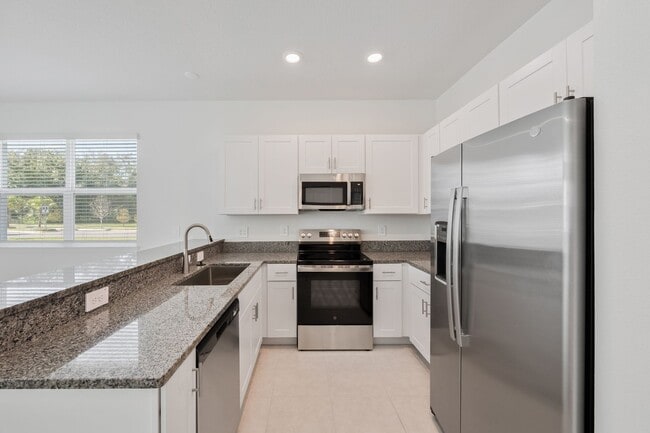 Building Photo - Brand New End Unit Townhome in Angeline Co...