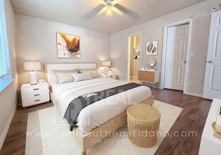 Building Photo - Spacious & Updated 2 Bedroom, 2 Bathroom Twin Home in Ammon with Garage, Fenced Backyard, and Hoo...