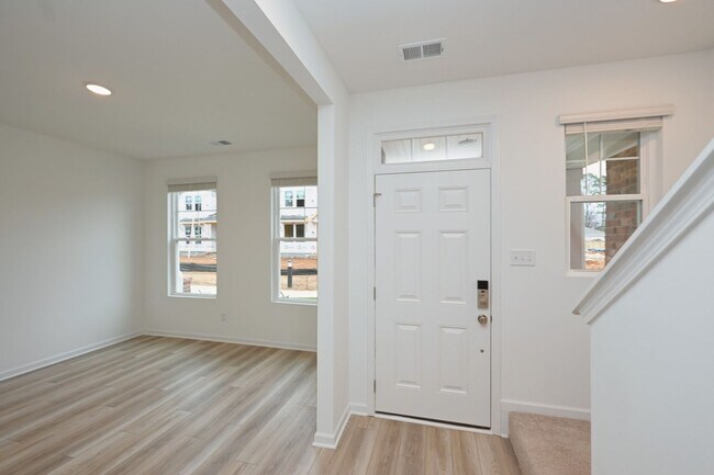 Building Photo - **BE THE LUCKY ONE TO LIVE IN THIS 2024-BUILT BRICK TOWNHOME IN THE VILLAS AT REGAL SQUARE FEATUR...