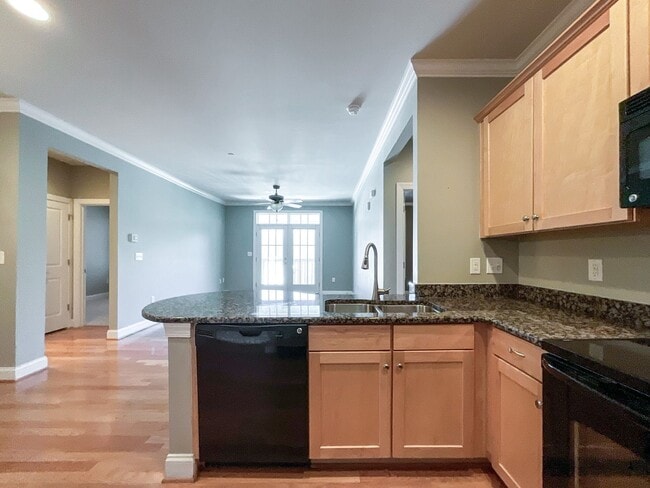Building Photo - COMING SOON! Charlotte Living at Its Best!...