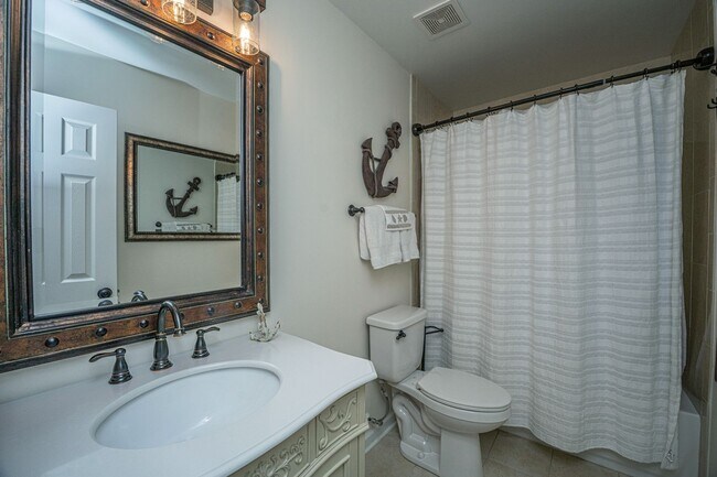 Building Photo - Gorgeous 4 BR/2BA Marshfront Home With Cre...