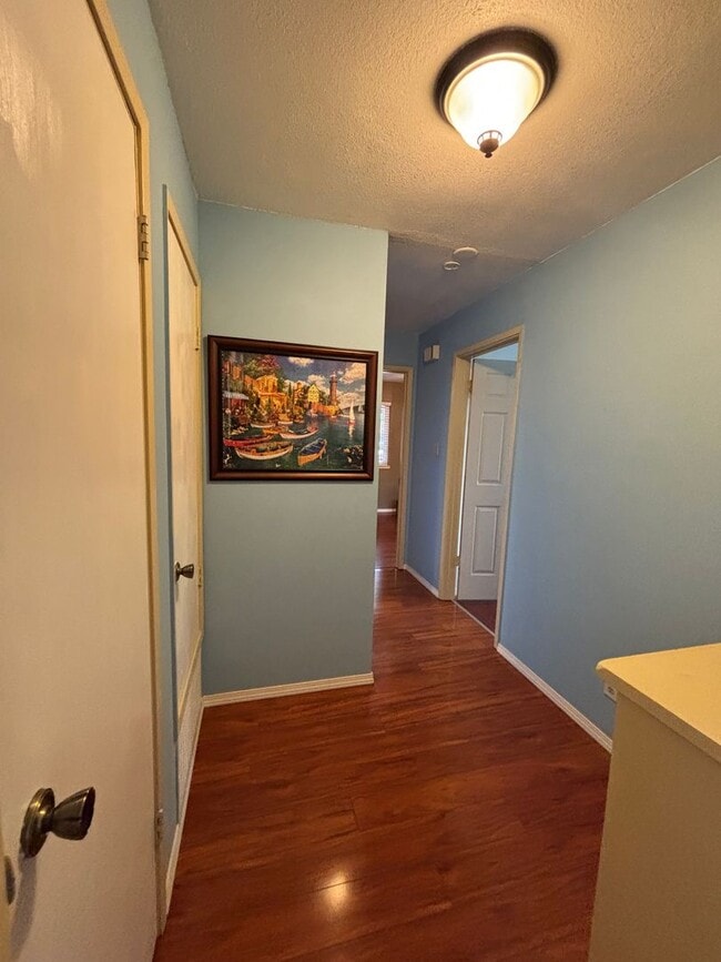 Building Photo - Beautiful Single-Story Townhome on Corner Lot with Private Courtyard & 2-Car Garage