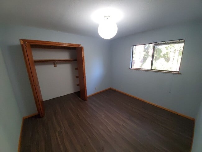 Building Photo - Spacious 1 bedroom with deck, wooded view & garden area. Most utilities included.