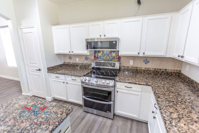 Building Photo - 14099 W Riviera Dr