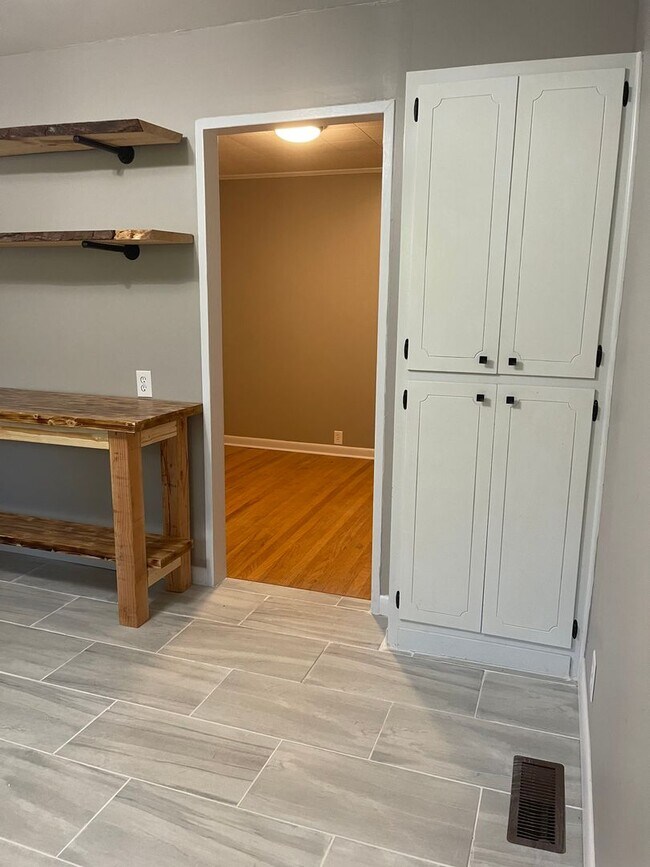 Building Photo - Beautifully renovated Normaltown 3/2 Home with fenced in front yard! Water, trash, and lawncare i...