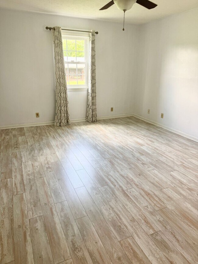 Building Photo - Hard-to-Find Home with Garage & Detached Shed & Modern Updates