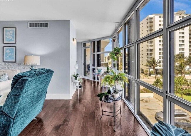 Building Photo - 6423 Collins Ave