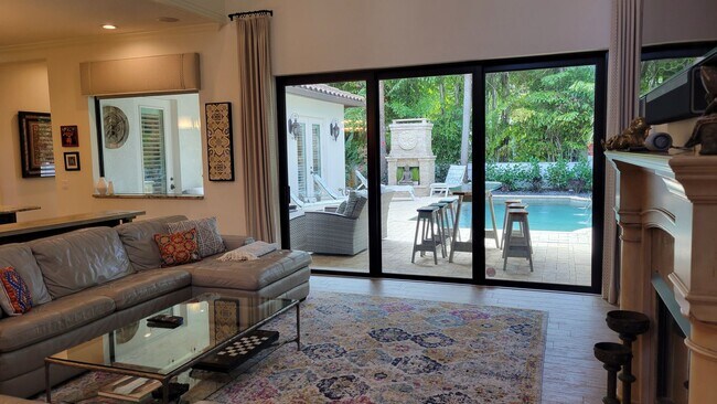 Building Photo - Seasonal stunning 5/5 pool home west of trail near Siesta Key!