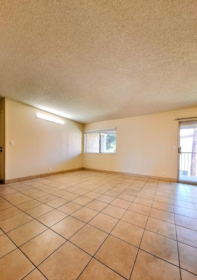 Building Photo - Beautifully Remodeled Second Floor Condo A...