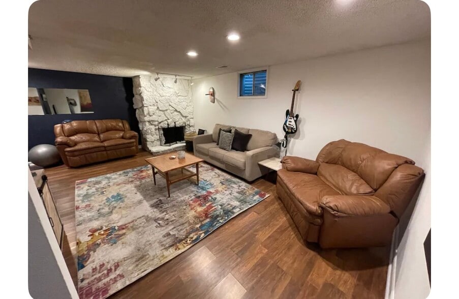 Basement Living room and workout equipment - 1792 Robb St