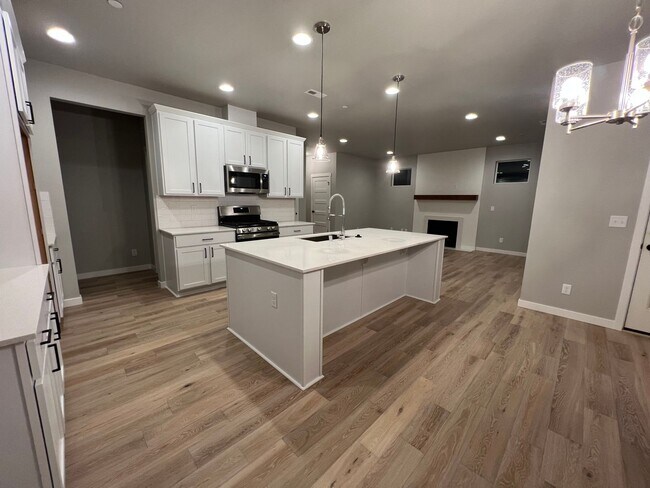 Building Photo - Like New 2022 Built 5 bedroom home