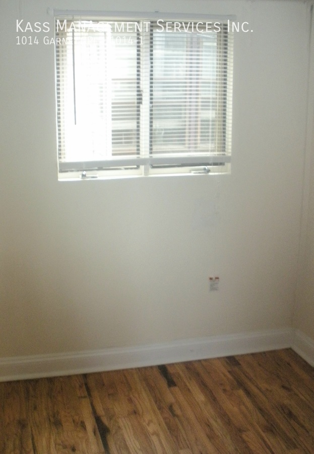 Building Photo - Very Spacious Duplex Apartment features 4 ...