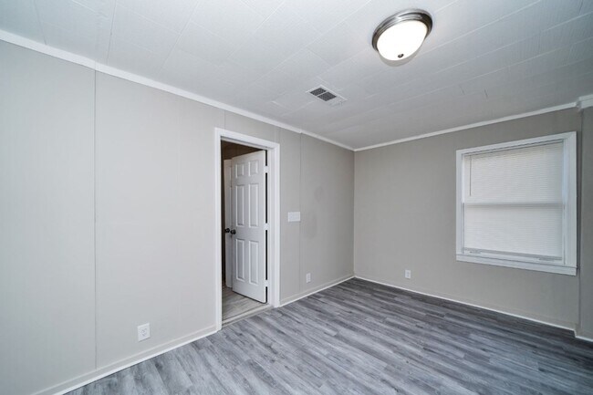 Building Photo - Rare Find in Pleasant Grove – Stunning 2BR Home with Oversized Rooms & Huge Fenced Yard!